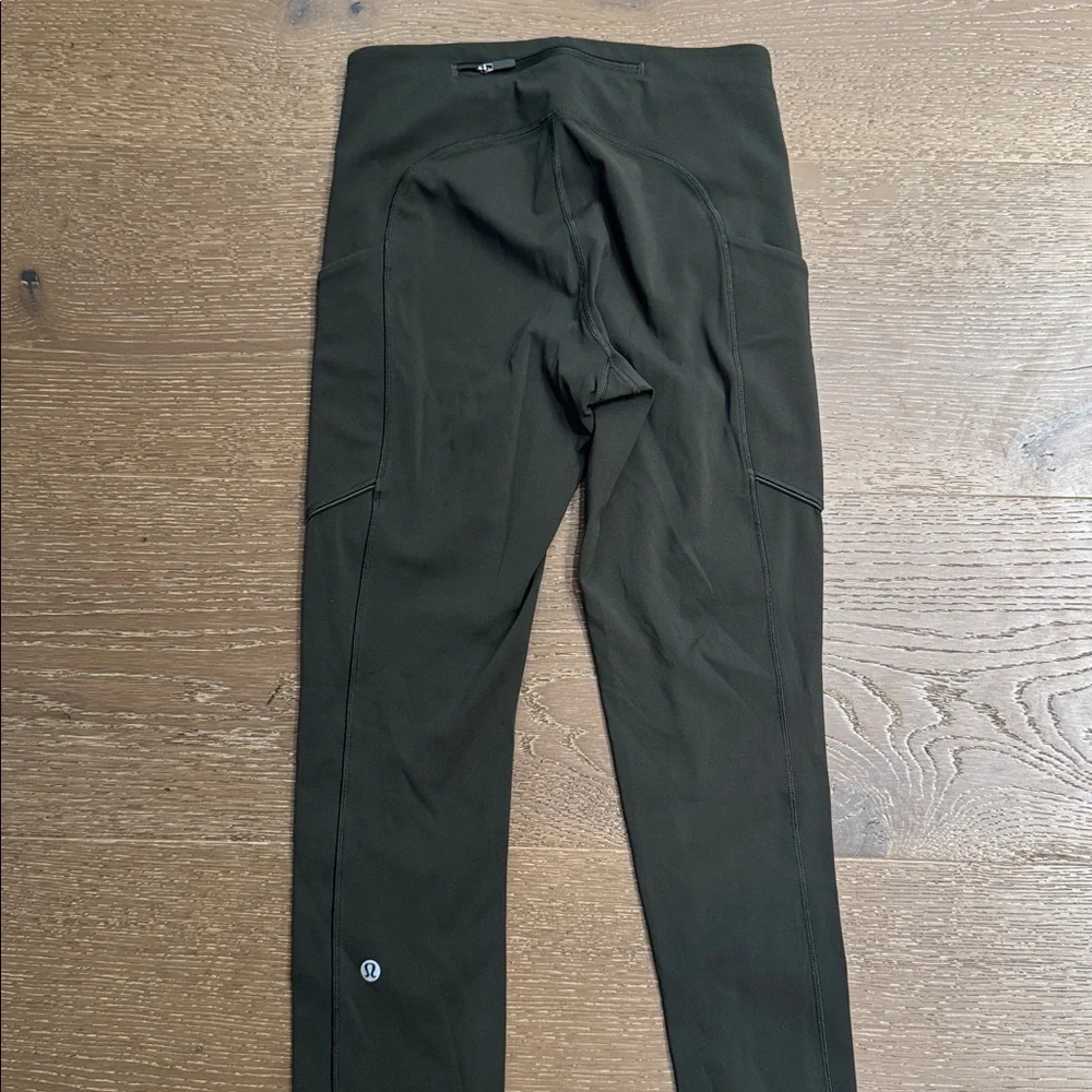 Lululemon High Rise Running Leggings Olive Green Size 4 Side Pockets Zip Back